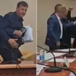 nebojša vukanović i čovjek iz obezbjeđenja koji ga sprečava da dođe do nenada stevandića