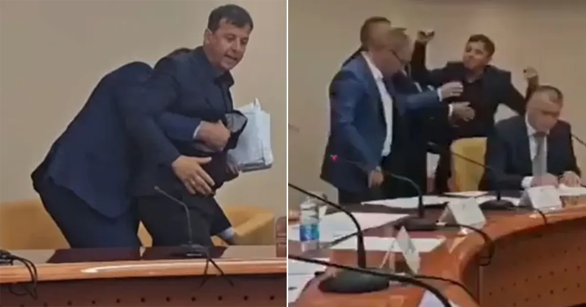 nebojša vukanović i čovjek iz obezbjeđenja koji ga sprečava da dođe do nenada stevandića