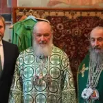 Ukrajinski političar Vadym Novynskyi i mitropolit kijevski Onufrije s patrijarhom Kirilom